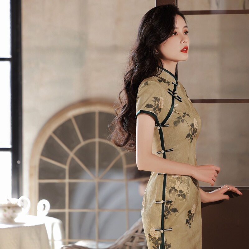 复古国潮风黄色针织提花旗袍2026年春季新款短袖改良年轻款连衣裙