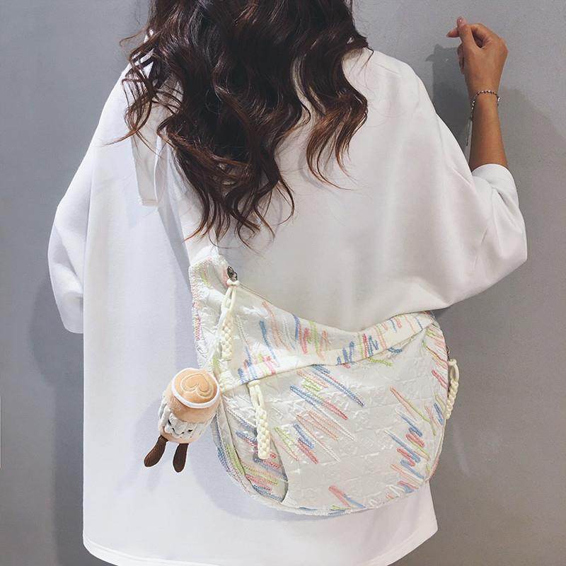 韩版大容量帆布包包女2025新款上班通勤斜挎包运动旅游骑行饺子包,箱包皮具/热销女包/男包,通用款女包,淘宝优惠券,粉丝福利购,淘宝优惠卷