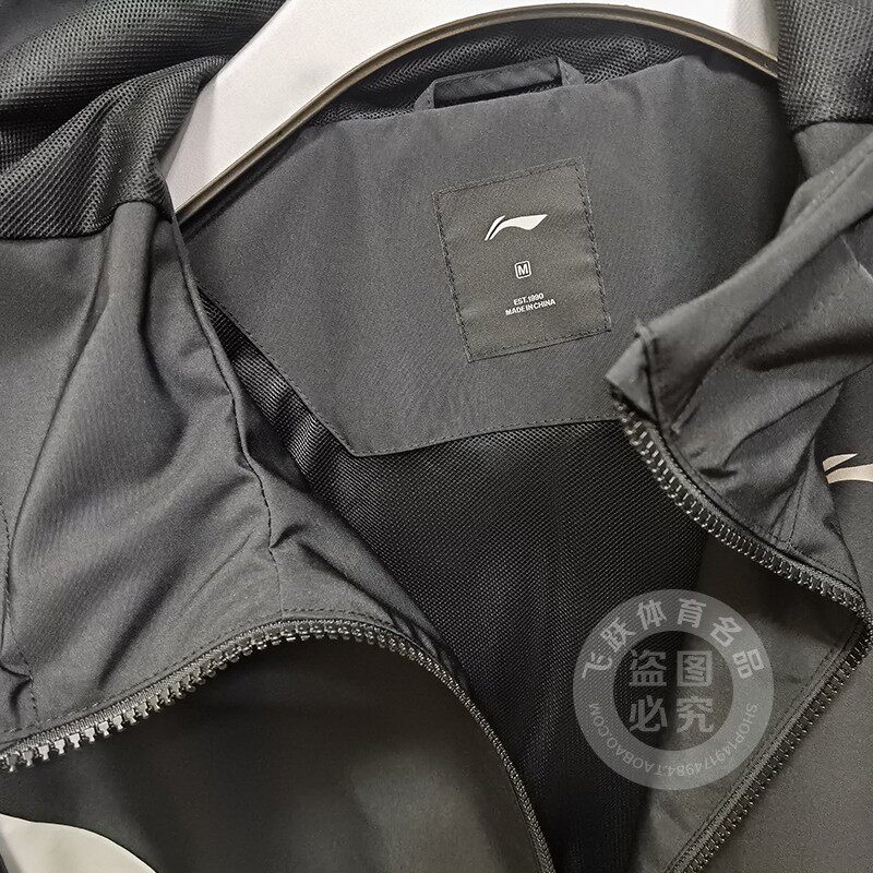 LI NING 남자 2023 봄 새로운 피트니스 방수 느슨한 통기성 후드 스포츠 윈드 브레이커 자켓 AFDT033