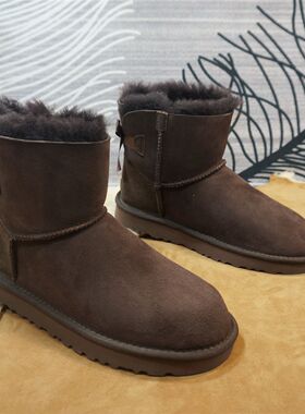 83-1新款真皮羊皮毛一体雪地靴后丝带平跟女靴保暖棉靴