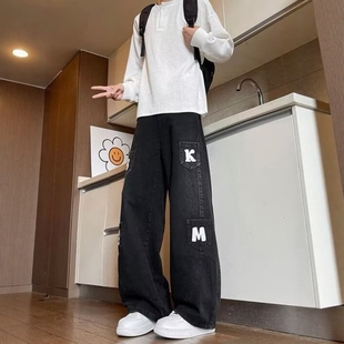 美式高街黑色弯刀裤男秋季新款小众设计感工装牛仔裤显腿长微喇裤