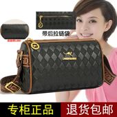 香港耐用真皮圆筒包大容量单肩轻便斜跨包黑色宽带牛皮枕头包女