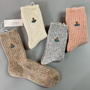 25年秋冬新款西太后袜子土星刺绣双针羊毛袜纯色保暖时尚中筒女袜
