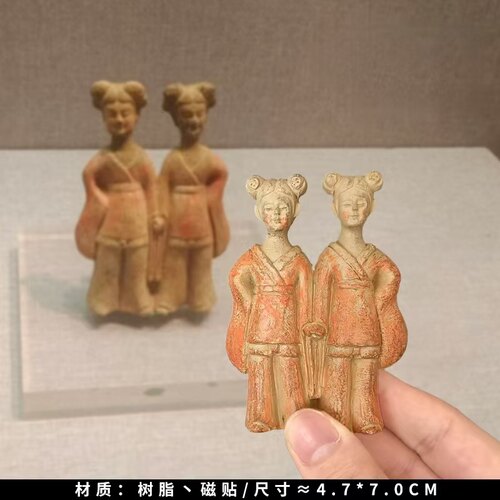 洛阳博物馆半面佛姐妹俑龙门石窟