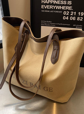 休闲大容量帆布包女2026新款简约小众通勤托特包大学生上课单肩包