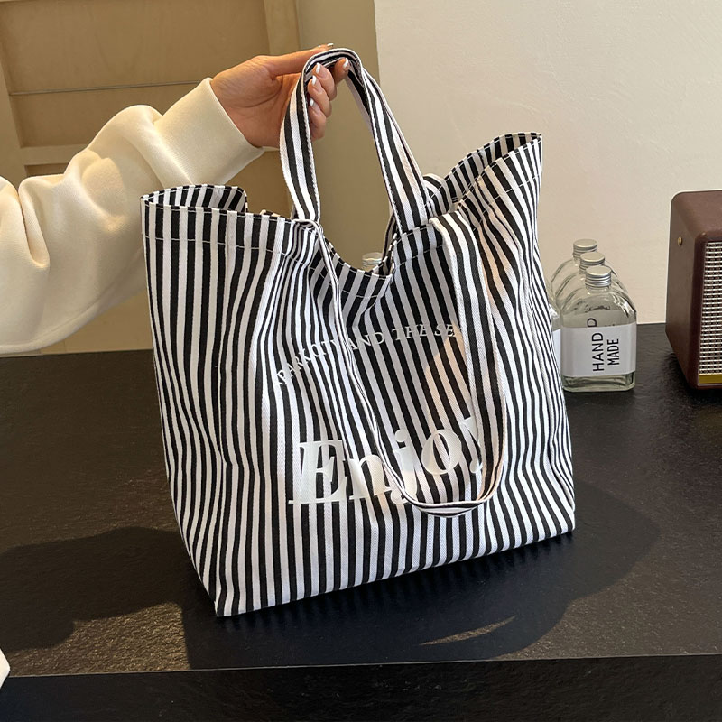 字母手提袋大学生单肩通勤包