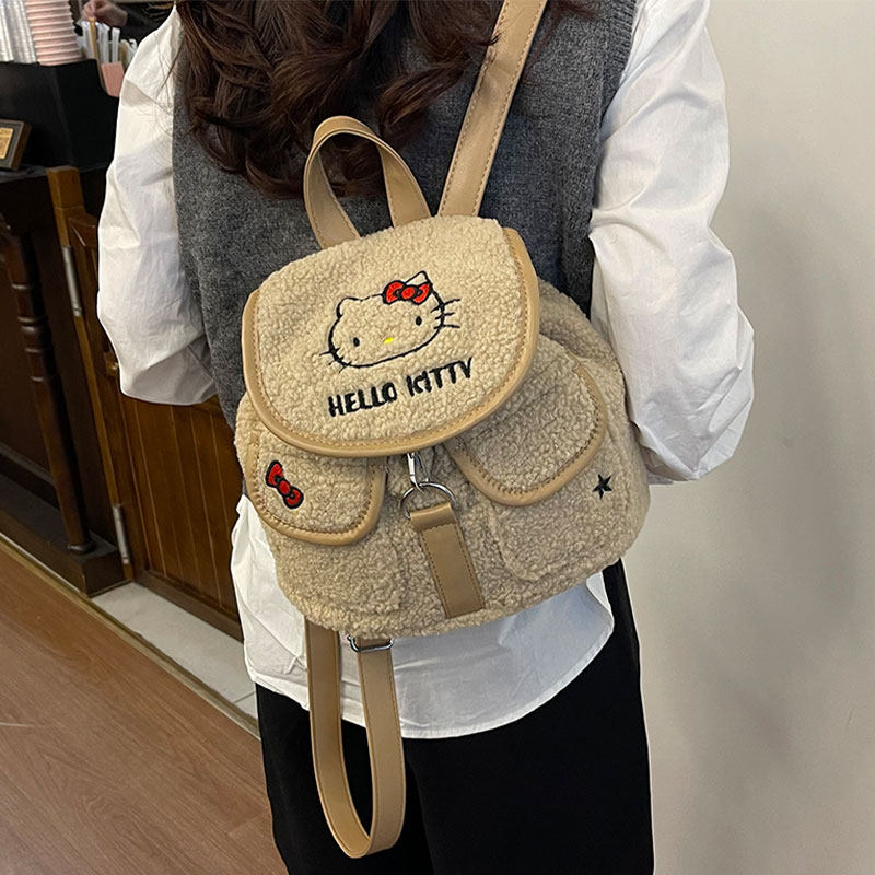 毛茸茸双肩包包女2025新款可爱卡通学生书包休闲外出大容量通勤包