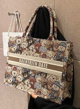 涂鸦小熊刺绣托特包包女2025新款小众手提单肩包大容量斜挎通勤包