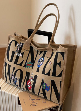 外出通勤包女大容量包包2025新款字母手提袋帆布单肩妈咪包托特包