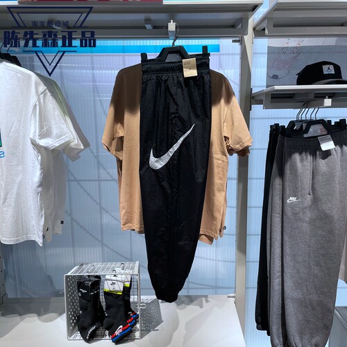 正品耐克长裤女子春秋新款梭织防风大勾束脚运动裤DM6184-010-100