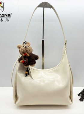 TUCANO/啄木鸟商场同款女包2025新款时尚腋下包高档牛角包TBK6611