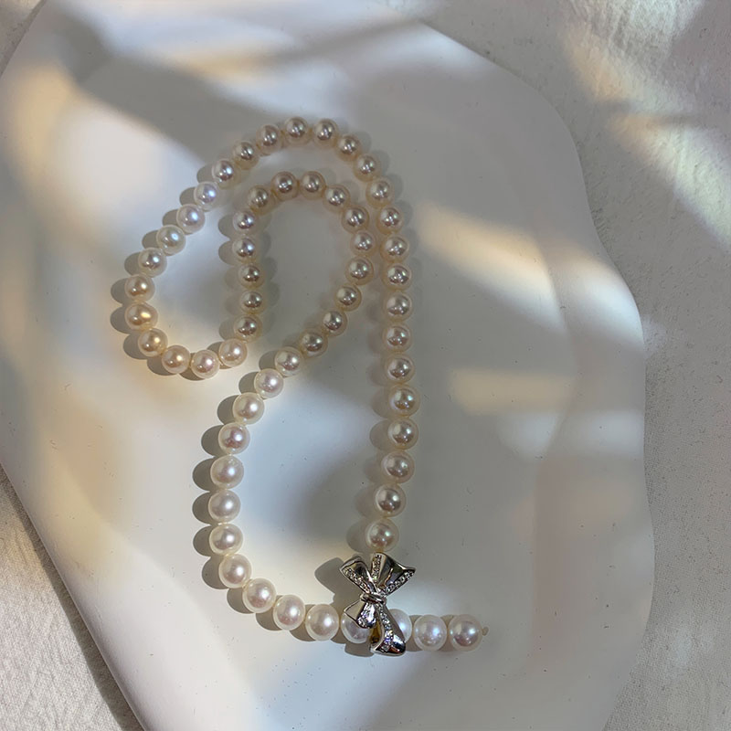 甄奢蝴蝶结诸暨无核淡水珍珠项链