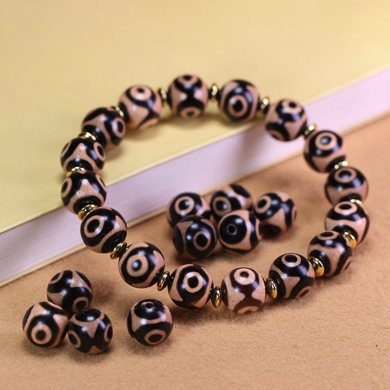 5A级西藏天然真品老矿原石玛瑙金刚虎牙三眼天珠手串10*10mm左右