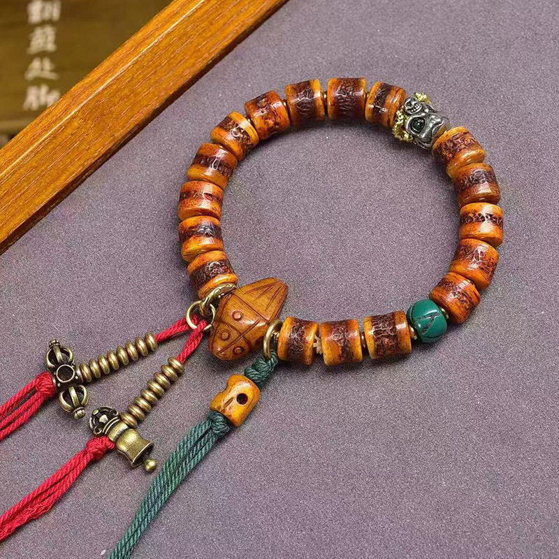 藏传回流牦牛骨文玩手串单圈藏式佛珠老铜大鹏鸟擦擦配饰复古手链