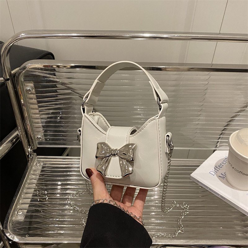 儿童包新款女孩糖果色蝴蝶结迷你手提包女童亲子链条斜挎包口红包