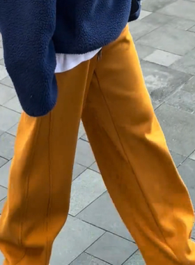 橙色加绒厚实拼接显瘦抽绳弯刀裤女冬季流行新款宽松显瘦休闲裤子
