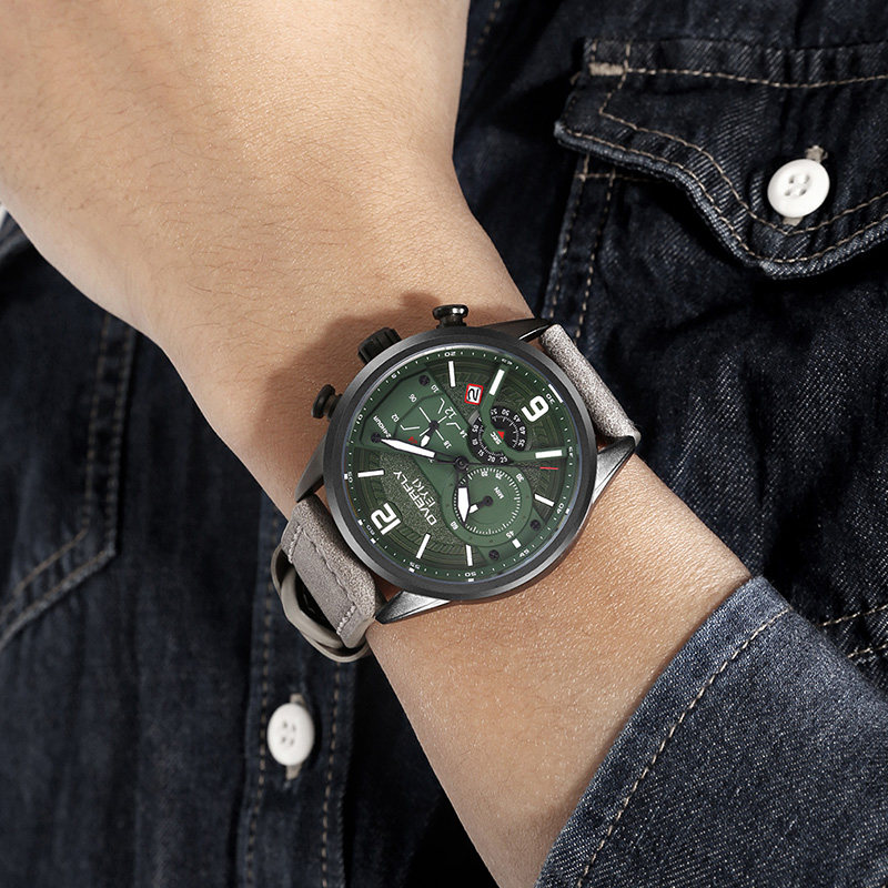 Серо-черный корпус, зеленая поверхность