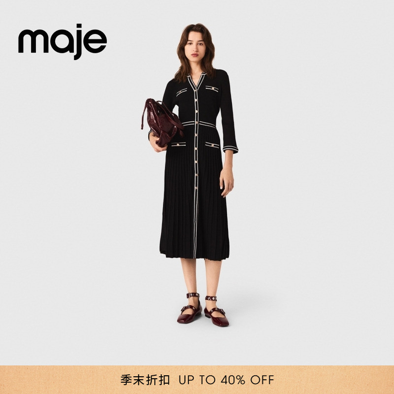 时尚黑白撞色V领设计 气质收腰长款款式