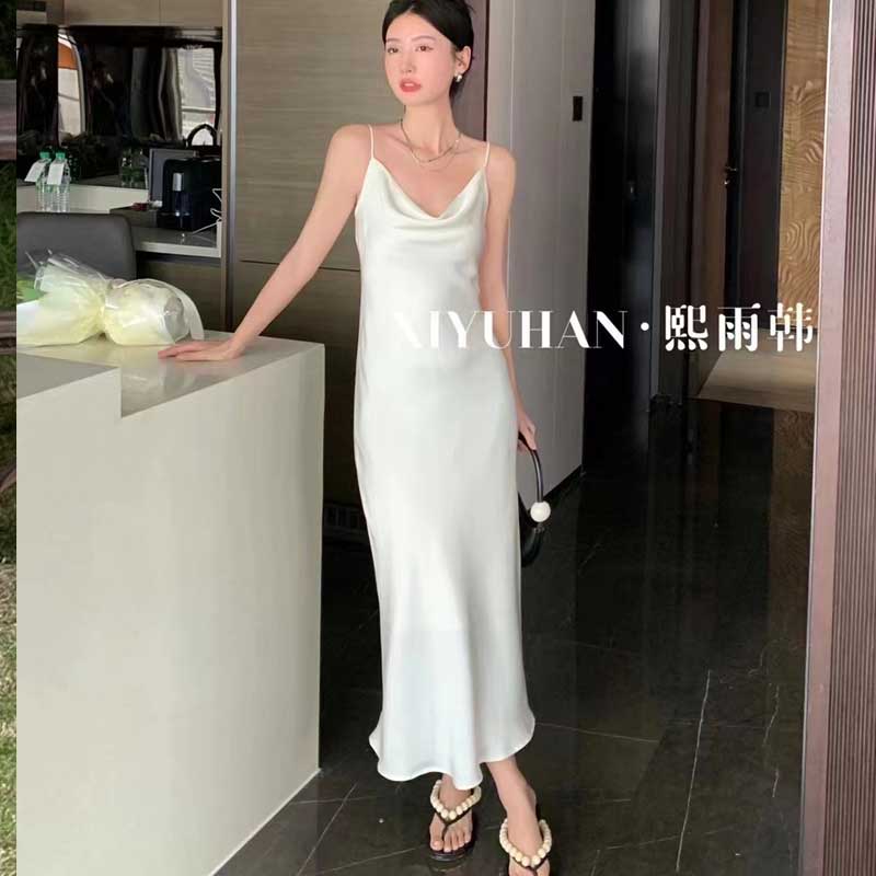熙雨韩法式奶杏吊带连衣裙女夏高级感醋酸缎面裙子气质长裙