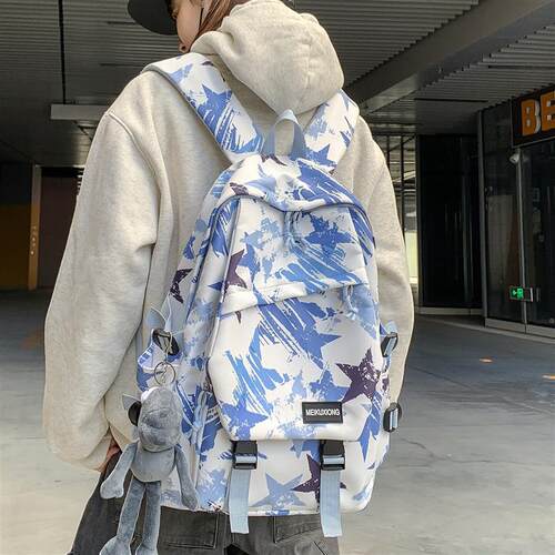 美式街头星星涂鸦书包男款潮牌初中生高中学生揹包女高颜值双肩包