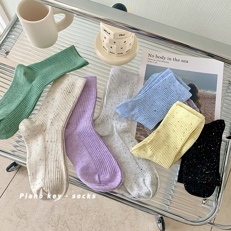 简约女点子纱细条中筒袜