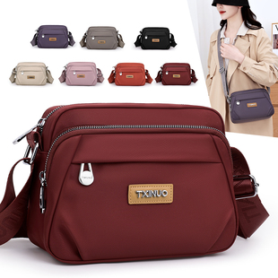 防水牛津布妈妈女包休闲背包简约多层外出单肩斜挎包帆布大容量女