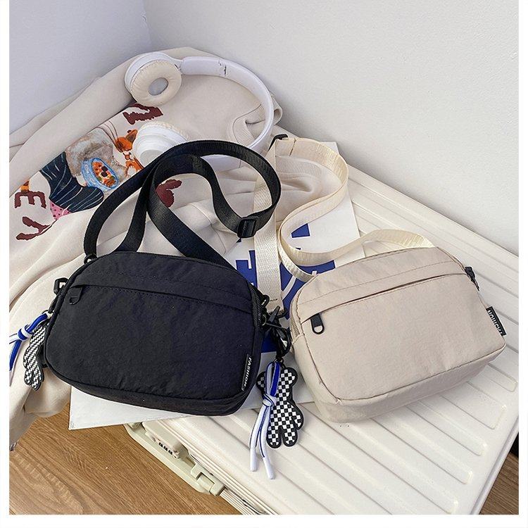 新款马卡龙色尼龙小方包防水轻便帆布包包休闲百搭单肩斜挎手机包