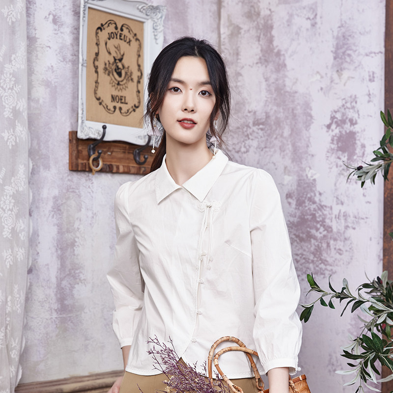 2023年布符秋季新款原创设计时尚休闲流苏扣弧摆衬衫女士别致洋气怎么看?