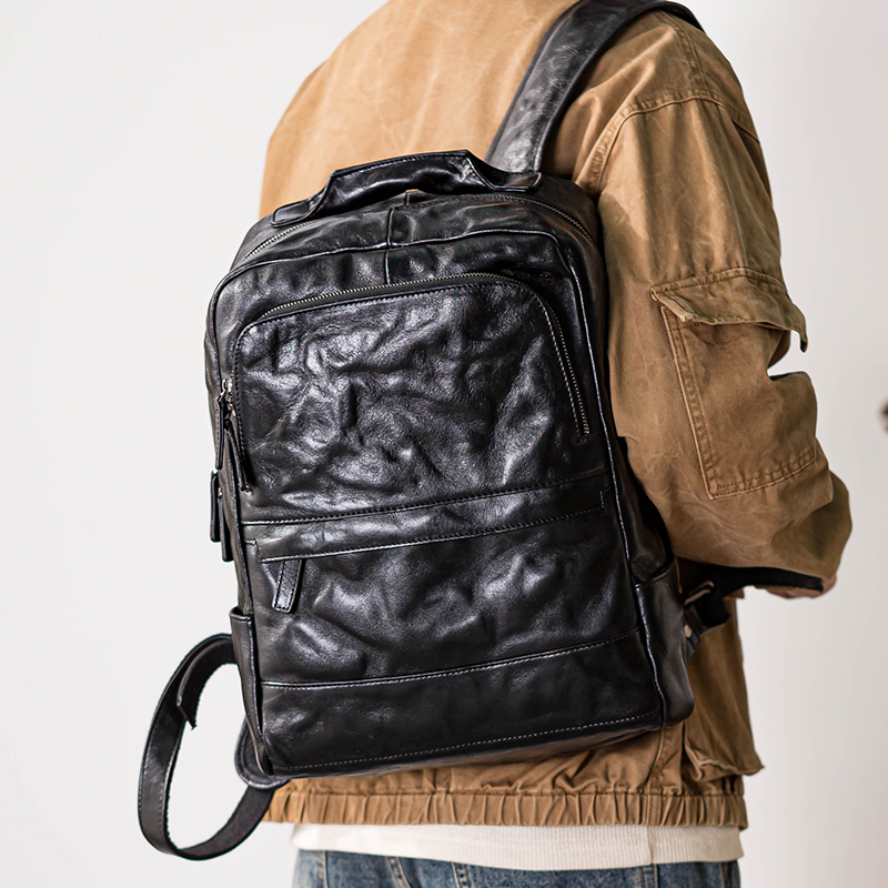男士双肩包头层牛皮背包