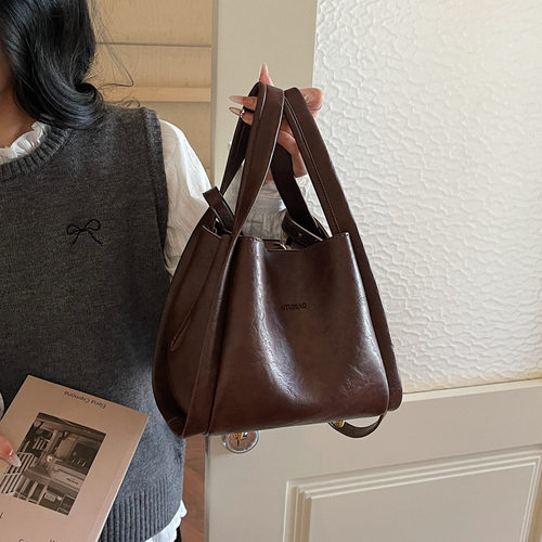 高级感小包包女2025新款秋冬手提菜篮子包百搭斜挎包水桶包小拎包