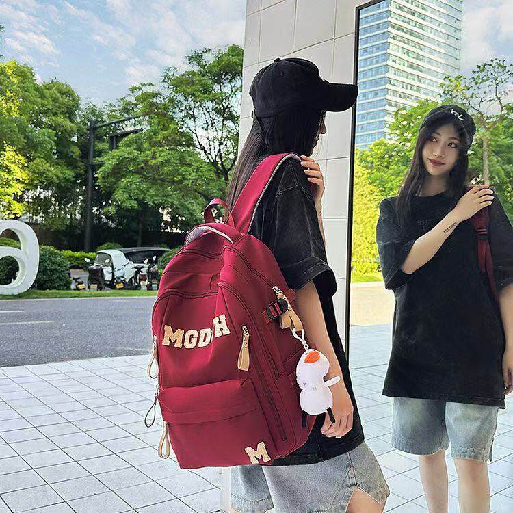 学生书包初中生男高颜值双肩包男生高中生时尚潮流大学生背包女款