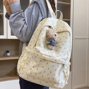 日系ins灯芯绒双肩包女小学生初中生轻便校园书包蝴蝶结少女背包