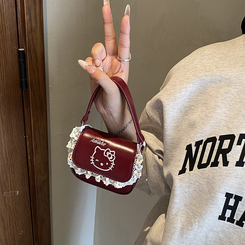 可爱复古猫咪法棍包2025小众设计新款女式百搭韩版ins手提斜挎包