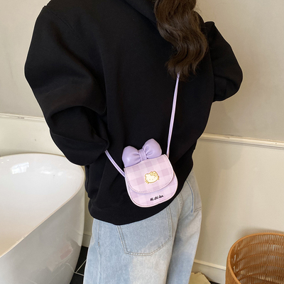 hellokitty女生包包2025新款儿童迷你斜挎包蝴蝶结时尚耳机小圆包