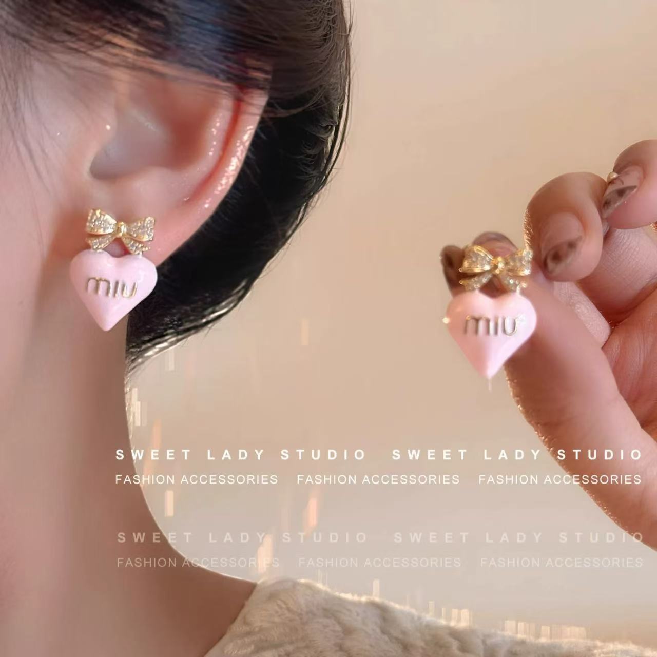 粉色滴油爱心蝴蝶结微镶锆石耳环S925银针淑女气质百搭时尚耳环