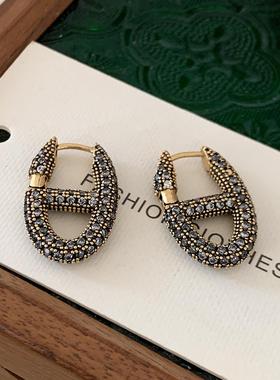 黑色满钻猪鼻子耳环2025新款爆款小香风耳扣女轻奢高级感欧美耳饰