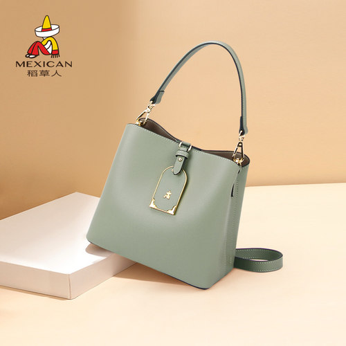 稻草人女包牛皮真皮水桶包