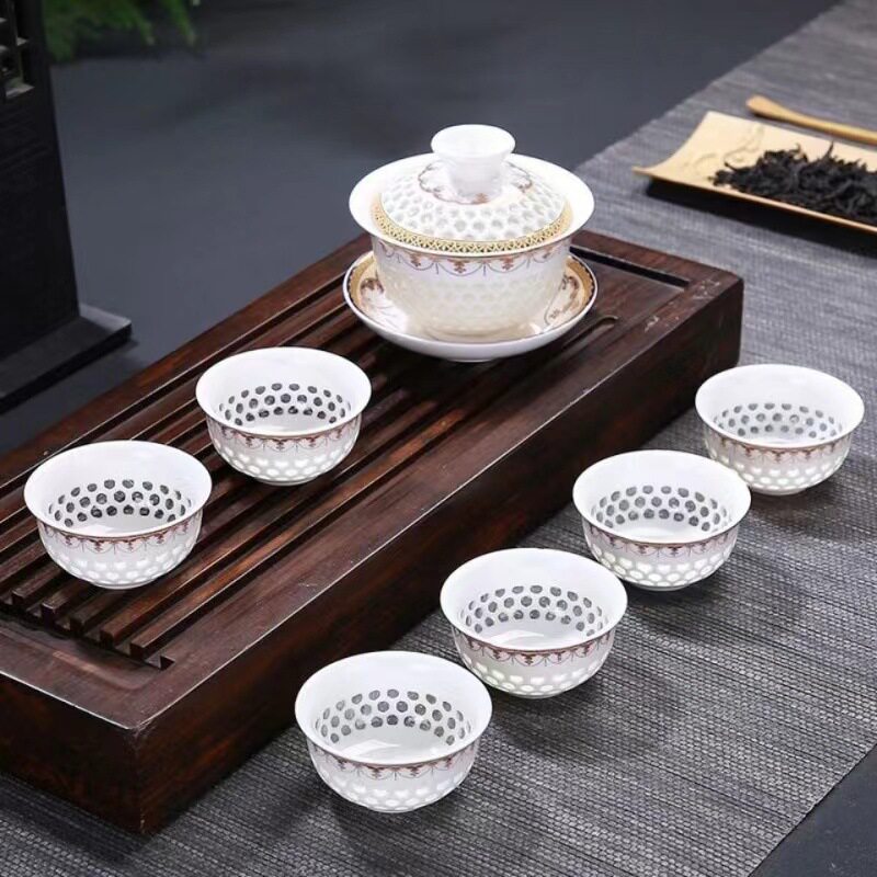 批发冰晶蜂巢玲珑陶瓷茶具整套镂空青花金线功夫茶具盖碗茶杯套装