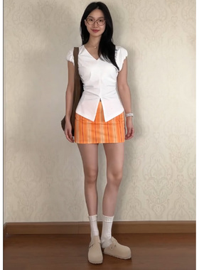 美式辣妹复古橙色格纹超短裙女带安全裤低腰竖条印花a字半身裙