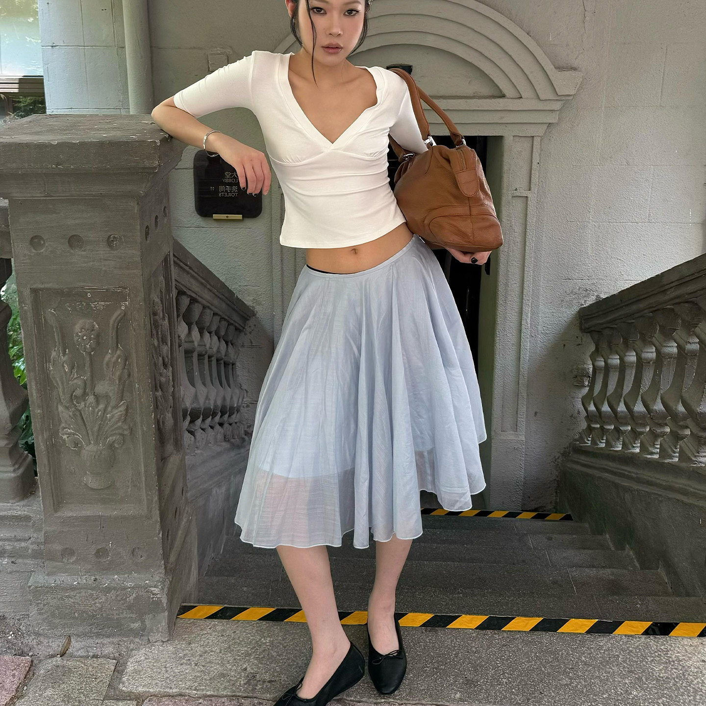 法式复古蓝色半身裙女2026新款飘逸低腰宽松休闲百搭不规则A型裙
