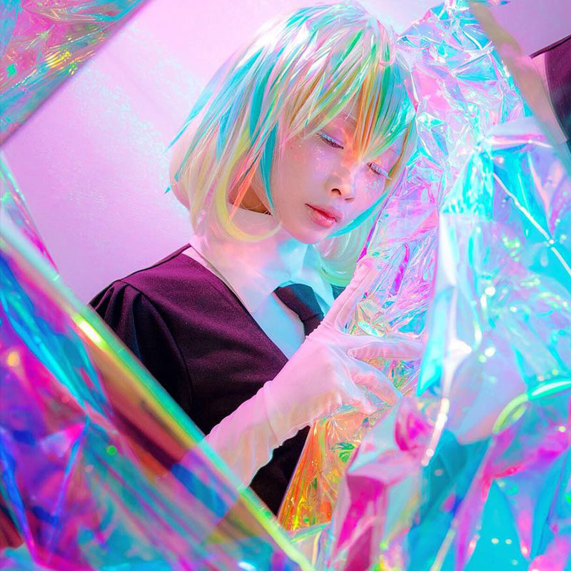 设计师镭射pvc反光面料布料透明七彩荧光服装炫彩幻彩包创意防水