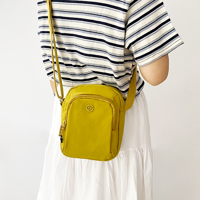 牛津布背包女小包包2025新款百搭斜挎包轻便多口袋帆布单肩包休闲