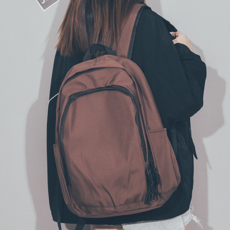 书包女韩版时尚纯色高中大学生双肩包轻便大容量百搭旅行背包男潮
