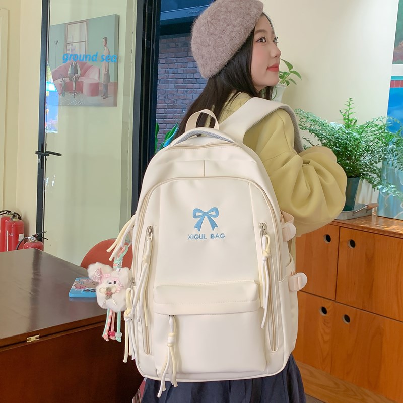 少女风蝴蝶结大容量白色双肩包