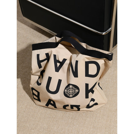SUK 点睛单品！时髦帆布包订制logo包 獨家设计撞色字母手提包