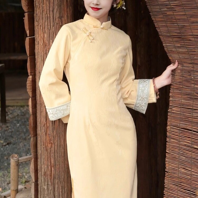 绝美显白黄色新中式旗袍2025新款秋冬连衣裙年轻款少女气质日常款