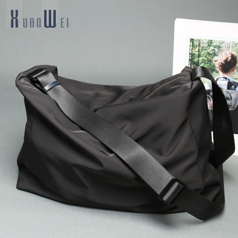 轩唯男士斜挎包大容量休闲运动背包健身女生布包潮流旅行包单肩包