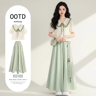 艺术生明媚穿搭独特漂亮绝美连衣裙子2026夏季新款多巴胺海边长裙