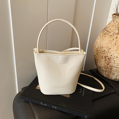 LAOYJA高级感复古小众斜挎水桶包