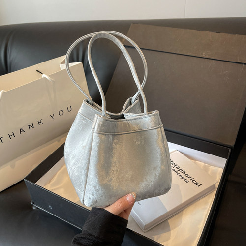 LAOYJA高级感复古小众斜挎水桶包